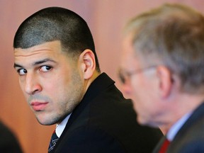 Former New England Patriots tight end Aaron Hernandez attends a pre-trial hearing in Fall River, Massachusetts December 22, 2014.  Hernandez is awaiting trial on charges of murdering semi-professional football player Odin Lloyd last year.    REUTERS/Brian Snyder