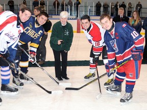The juvenile international Silver Stick finals got underway in Mooretown Thursday with opening ceremonies and the first slew of games. Kim Thomaes dropped a ceremonial puck between the captains from Walkerton, South Kent, Mooretown and Glanbrook. (SUBMITTED PHOTO)