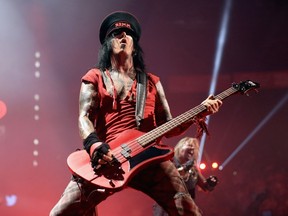 Musician Nikki Sixx of Motley Crue performs onstage during the 2014 iHeartRadio Music Festival at the MGM Grand Garden Arena on September 19, 2014 in Las Vegas, Nevada.  Christopher Polk/Getty Images for Clear Channel/AFP
