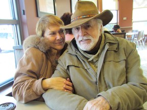 Cherie and David Barnett sit in a booth at the Tim Hortons in Corunna where he lost a treasured silver bracelet on New Year's Day. The couple is offering a reward for its return. PAUL MORDEN/ THE OBSERVER/ QMI AGENCY