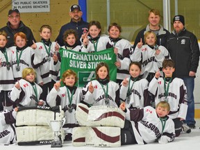 CONTRIBUTED PHOTO
Tillsonburg Horizon Seeds atoms won the Regional Silver Stick Atom A qualifying hockey tournament hosted by Pelham, Dec. 27-29, and will be playing in the North American International Silver Stick tournament in Sarnia, the weekend of Jan. 16-18. From left are (front) Charlie Cork, Matthew Evans, (2nd row) Liam Hicks, Owen Harris, Jack Soares, Nick Behman, Kaden Bailey, (3rd row) Travis Lamb, Hayden McLean, Devin Hawley, Brandon Balazs, Nolan McCrossin, Michel Laundrie, Brandon Homick, (4th row) and the coaching staff - Scott McLean, Ryan Balazs, Geoff Cork, Blair Hicks, and Duane Harris. Absent for the photo: Braxton VanRybroeck.