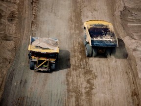 Shell trucks rolls along the Athabasca Oil Sands Project north of Fort McMurray, Alta. (Shell handout)