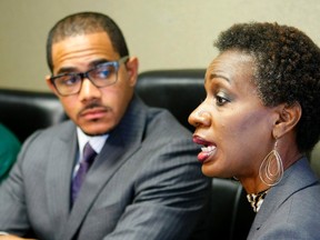 Pamela Champion, right, mother of Robert Champion, speaks next to her attorney Chris Chestnut during a news conference after new documents were released by Florida prosecutors in Atlanta, Georgia, May 23, 2012. Their son Robert Champion, a 26-year-old Florida A&M University drum major, died in November 2011 on a band charter bus after the university's renowned "Marching 100" band performed at the annual Florida Classic football game. (REUTERS/Tami Chappell)