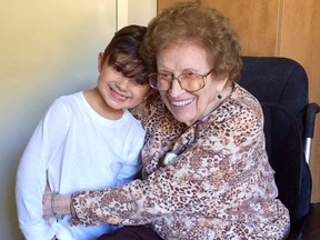 Frieda Spence shares a hug with her great-grandson Gabriel Mancinelli, 4, in this recent photo take at her Sprucedale Care Centre residence in Strathroy. Spence, a former Sarnia beauty queen, turned 100 years old Friday. (Submitted photo)