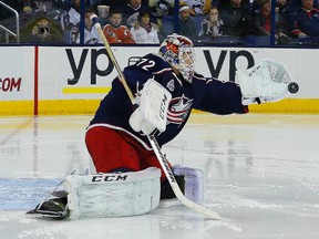 Columbus Blue Jackets goalie Sergei Bobrovsky gloves the puck against the Pittsburgh Penguins at Nationwide Arena. (Russell LaBounty/USA TODAY Sports)