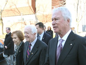 Former U.S. President Jimmy Carter, centre, seen during a visit to Kingston, has high praise for Sir John A. Macdonald. (Whig-Standard file photo)