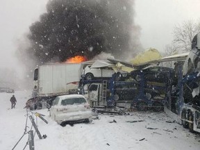 More than 123 vehicles were involved in a major pileup on the I-94 outside of Battle Creek, Mi, killing an Ottawa truck driver and injuring 23 drivers. Three trucks, including one carrying fireworks, were set ablaze and put under control by Michigan State Police. The crash occurred at 10 a.m. Friday, Jan. 9, 2015.  
(Courtesy Twitter _jgreener)
OTTAWA SUN/QMI AGENCY