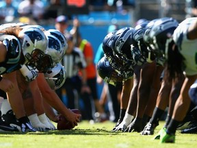 The Seahawks defensive line hopes to control the line of scrimmage tonight against the Carolina Panthers at CenturyLink Field. (GETTY IMAGES)