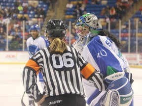 Shannon Szabados talks to a woman referee Friday during the Cottonmouths' game against the FireAntz in Fayetteville, N.C., which had a 'women in hockey' theme. (Rachel D. Ray, Special to the Edmonton Sun)