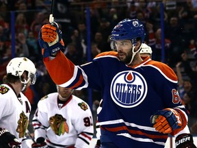 The Edmonton Oilers' Benoit Pouliot (67) celebrates his goal against the Chicago Blackhawks during first period NHL action at Rexall Place, in Edmonton Alta., on Friday Jan. 9, 2015. David Bloom/Edmonton Sun/QMI Agency