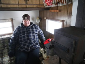 Gino Donato/The Sudbury Star
Bob Depatie sits in his trailer on Whitewater Lake, which features a furnace and woodstove.