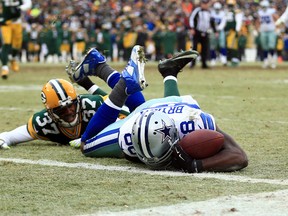 Dallas Cowboys wide receiver Dez Bryant (88) is unable to catch a pass against Green Bay Packers cornerback Sam Shields (37) in the fourth quarter in the 2014 NFC Divisional playoff football game at Lambeau Field. (Andrew Weber-USA TODAY Sports)