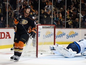 Anaheim Ducks right winger Tim Jackman gets one past Ondrej Pavelec during the second period on Sunday. (KELVIN KUO/USA TODAY Sports)