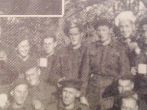 Lieut. Bill Anderson (back row standing with white hat), France 1944. (Contributed photo)