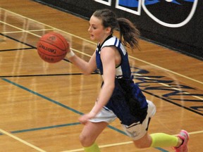 Daralan Ditto dribbles the ball towards the High River Senator Riley Colts’ zone during the girls' first game on Friday.
Simon Ducatel, Vulcan Advocate