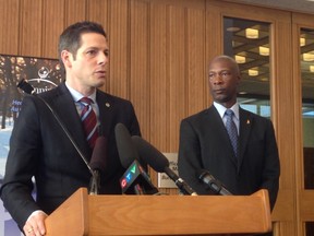 Mayor Brian Bowman and Winnipeg police Chief Devon Clunis address the media at city hall on Monday. (David Larkins/Winnipeg Sun)