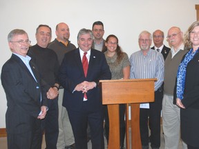 Representatives of different municipalities and groups in Elgin county were at Pearce Williams Christian Centre Monday for an announcement of federal funding under the Enabling Accessibility Fund. All received grants for different projects. Left, Central Elgin Mayor Dave Marr,  Malahide Mayor Dave Mennill, Joe Richards, executive director, Pearce Williams Christian Centre, Peter Van Loan, leader of the government in the House of Commons Brian Massachaele, director of community and cultural services Elgin county, Jessica Tenhorn, summer camp director, Pearce Williams Christian Centre, Randy Taylor, Trinity Anglican Church, Port Burwell, Bayham Mayor Paul Enns, Fred Shelly, Trinity Anglican Church, Port Burwell, Karen Vecchio, executive assistant to Joe Preston, MP, Elgin-Middlsex-London. Representatives of Southwold township and the City of St. Thomas were absent from the photo. (PATRICK BRENNAN, QMI Agency)