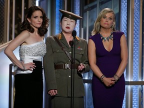 Actors Tina Fey, (L-R), Margaret Cho and Amy Poehler peform a comedy sketch at the 72nd Golden Globe Awards in Beverly Hills, California January 11, 2015.  REUTERS/Paul Drinkwater/NBC/Handout