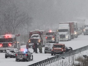 Sudden snow squalls were blamed for a series of New Year's Day collisions that closed the eastbound lane of Hwy. 401 for hours in the Kingston area. (Julia McKay/The Whig-Standard)