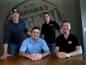 Pita Pit corporate staff members in Kingston Nelson Lang, front left, and Chris Fountain, rear, left, Kevin Pressburger and Braden Martyniuk.  (Ian MacAlpine/The Whig-Standard)