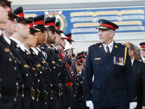 Toronto Police Chief Bill Blair inspects the new officers at the graduation ceremony at the police college in Etobicoke Thursday January 8, 2015. (Michael Peake/Toronto Sun)