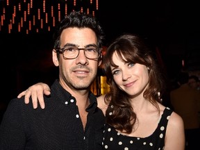 Jacob Pechenik (L) and actress Zooey Deschanel pose at the after party for the premiere of Roadside Attractions' "The Skeleton Twins" at The Argyle on September 10, 2014 in Los Angeles, California.  Kevin Winter/Getty Images/AFP