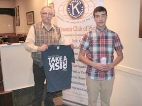 BRUCE BELL/The Intelligencer
PECI Student Galen Swackhammer (right) is pictired with Kiwanian Rod Holloway at the Beck & Call in Picton last week. Swackhammer recently attended the Key Leader Camp in Arden and was at the kiwanis meeting to update members on his participation.