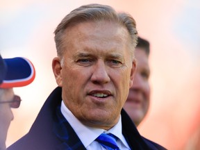 John Elway started off Tuesday's press conference by accidentally thanking himself. (AFP)