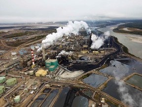 The Suncor processing plant near the Athabasca River at their mining operations near Fort McMurray, Alberta, September 17, 2014.  REUTERS/Todd Korol