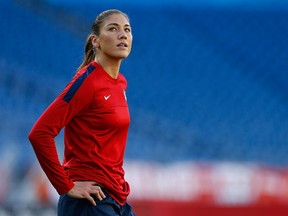 U.S. women's national goalkeeper Hope Solo warms up prior to the game against Korea Republic at Gillette Stadium on June 15, 2013. (Jared Wickerham/Getty Images/AFP)