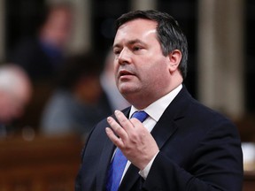 Canada's Employment Minister Jason Kenney speaks during Question Period in the House of Commons on Parliament Hill in Ottawa, Dec. 9, 2014. (CHRIS WATTIE/Reuters)