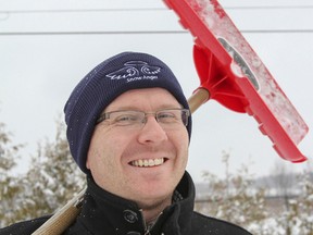 Derek Ochej, the public education coordinator for the City of Kingston, is wearing one of the special Snow Angels toques in Kingston. The city's Snow Angel program was started last year and is a way for Kingston residents to show appreciation to those who lend a helping hand in the winter. (Julia McKay/The Whig-Standard)