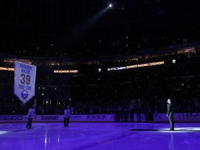 Buffalo Sabres former goalie Dominik Hasek gets his number retired at a ceremony before a game against the Detroit Red Wings at First Niagara Center on Jan. 13, 2015. (Timothy T. LudwigéUSA TODAY Sports)