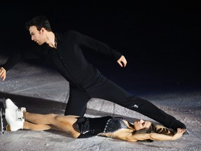 Figure skaters Eric Radford and Meagan Duhamel perform during Rock the Ice V at the Memorial Centre earlier this month. (QMI Agency/photo)