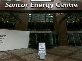 Suncor Energy has announced it will cut 1,000 from it's workforce to deal with lower crude prices in Calgary, Alta. on Tuesday January 13 2015. Darren Makowichuk/Calgary Sun/QMI Agency
