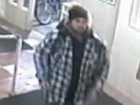 A screengrab of a 'person of interest' in the Dec. 3 murder of Wasfi Ghalba at 200 Wellesley St. E.