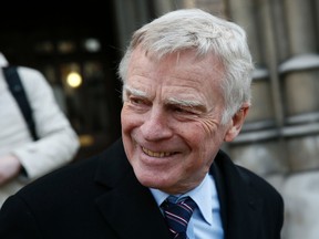 Former FIA racing chief Max Mosley leaves the High Court in London on Wednesday, Jan. 14, 2015. (Stefan Wermuth/Reuters)