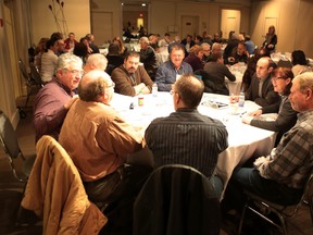 Farming and agriculture experts gather in Kingston on Jan. 14 to talk about the Ontario government's proposed plan to protect bees and other pollinators. (Elliot Ferguson/The Whig-Standard)