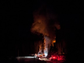 Firefighters from Whitecourt and Woodlands County, as well as RCMP and paramedics respond to a blaze at the Mcleod Valley Greenhouses early in the morning on Friday January 9, 2015 outside of the town of Whitecourt.

Adam Dietrich | Whitecourt Star