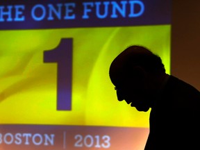 Ken Feinberg, administrator for "The One Fund, Boston" talks to a Boston Marathon bombing survivor before a town hall style meeting about the fund in Boston, Massachusetts May 7, 2013.  "The One Fund, Boston" is a fund for the victims of the Boston Marathon bombings. REUTERS/Brian Snyder