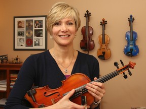 Acclaimed Canadian fiddler, singer and step-dancer Kelli Trottier at her Kingston home. (Julia McKay/The Whig-Standard)