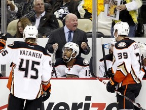 The Anaheim Ducks’ Bruce Boudreau is one of three head coaches the Maple Leafs are facing on this road trip that they are reportedly interested in having as their own bench boss. Toronto was visiting the Ducks on Wednesday night. (Getty Images/AFP)