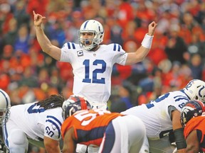 Colts quarterback Andrew Luck led his team with his arm and his feet against the Denver Broncos last week. (USA TODAY SPORTS)