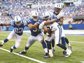 Colts backup linebacker Josh McNary (middle) has been charged with rape, according to multiple reports out of Indianapolis. (AFP)