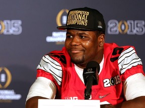 Quarterback Cardale Jones #12 of the Ohio State Buckeyes talks to the media after defeating the Oregon Ducks during the College Football Playoff National Championship Game at AT&T Stadium on January 12, 2015 in Arlington, Texas. (Sarah Glenn/Getty Images/AFP)