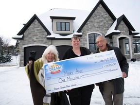 Dream Lottery winners Marcy DiMaria (left) and Mary Anic pose with their prize in London, Ont., Jan. 15, 2015. (DEREK RUTTAN/QMI Agency)