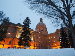 The Alberta Legislature is seen at sunset in Edmonton, Alta., on Tuesday, Nov. 25, 2014. The building, housing the provincial government and legislative body, is being decorated for the holidays. Ian Kucerak/Edmonton Sun