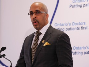 Dr. Ved Tandan, president of the Ontario Medical Association, speaks to the media in Toronto on Jan. 15, 2015. (Jack Boland/Toronto Sun)