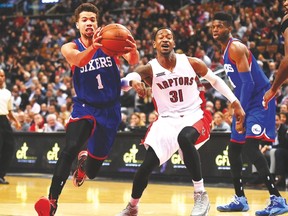 Philadelphia 76ers guard Michael Carter-Williams (left) gets past Raptors forward Terrence Ross on Wednesday night at the ACC. Ross played just over 18 minutes in a frustrating performance. (USA TODAY)
