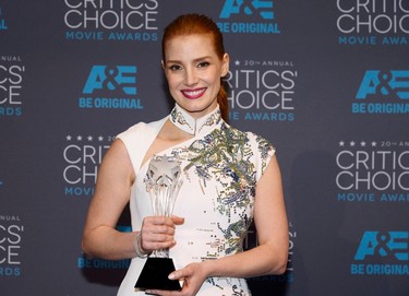 Actress Jessica Chastain poses backstage with her MVP award during the 20th Annual Critics' Choice Movie Awards in Los Angeles, California January 15, 2015.  REUTERS/Kevork Djansezian